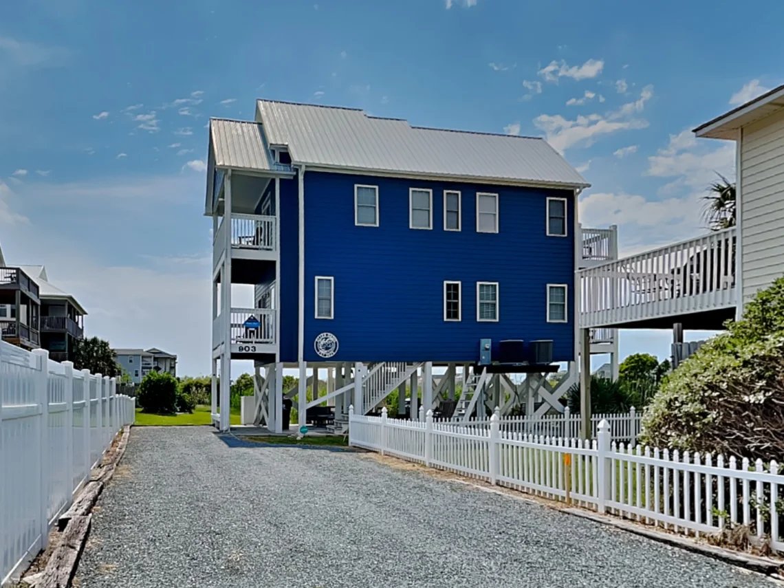 Otter Oasis blue beach house exterior